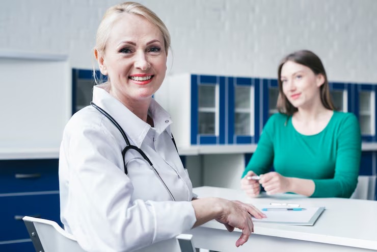 When should a woman establish primary care?